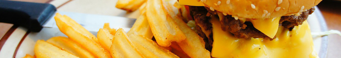 Eating Burger at Sam's Burgers restaurant in Houston, TX.